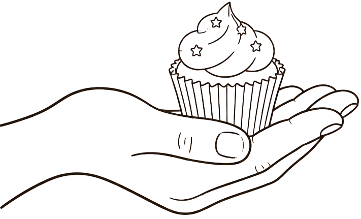 A mother's hand gently holding a cupcake